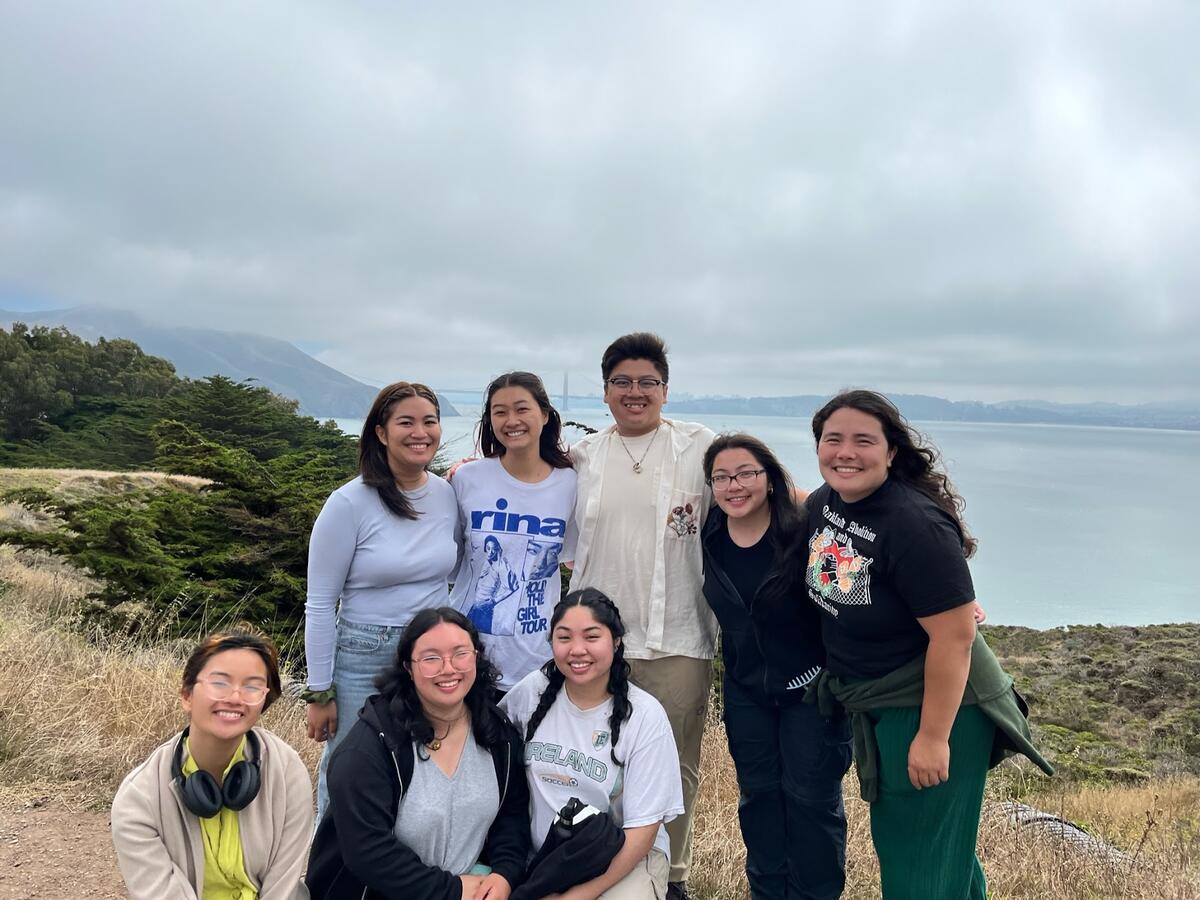 Group photo of AAPA interns standing with the Golden Gate Bridge behind them