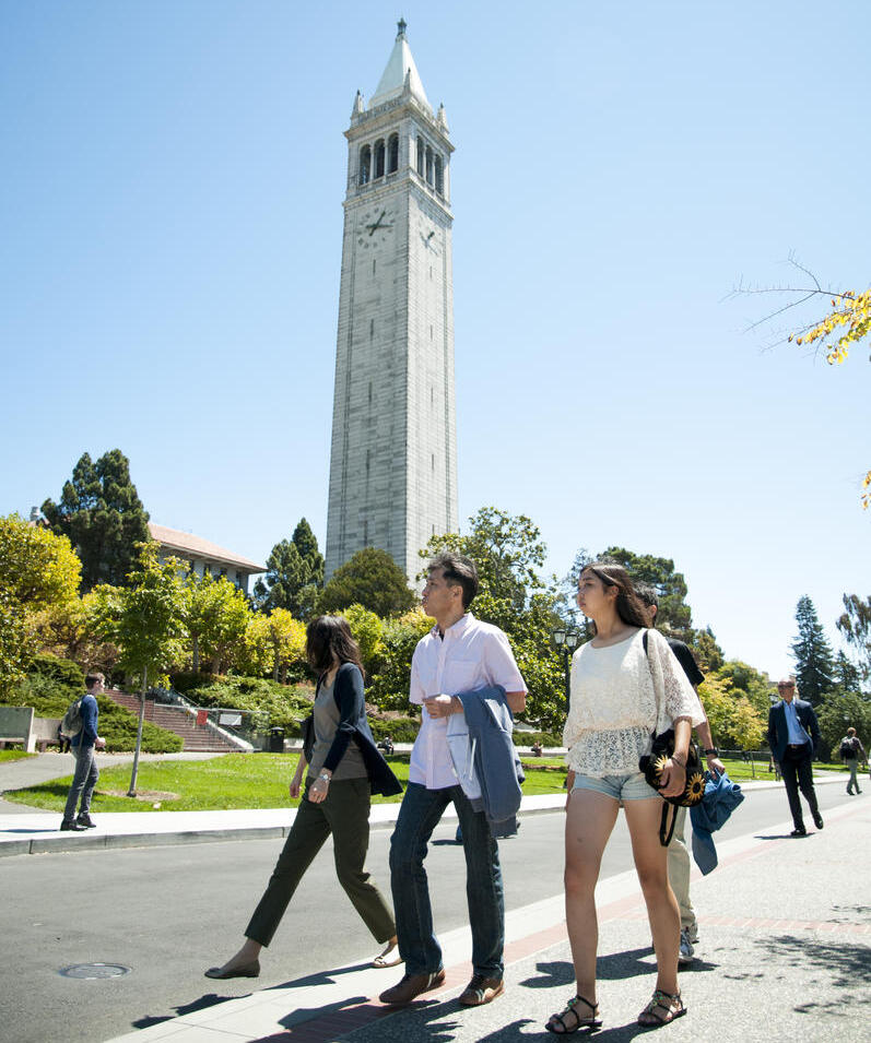 Students walking in front of bell tower