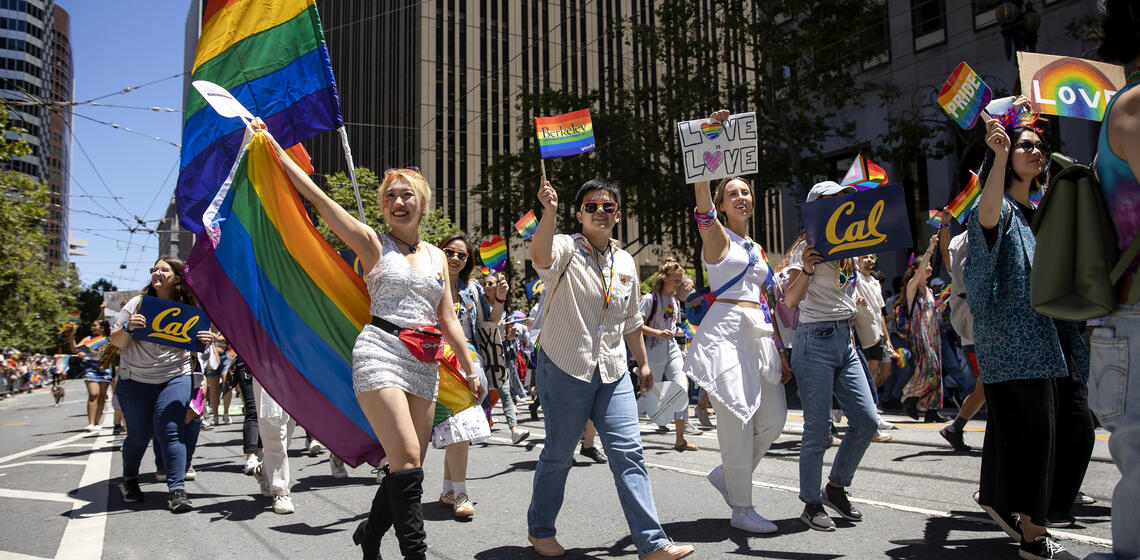 Students and members of Cal Alumni Association walk in the SF Pride Parade