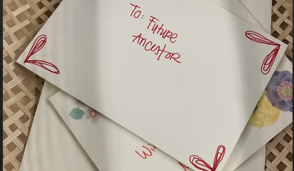 Pictures of envelopes in basked labeled "Dear Future Ancestors
